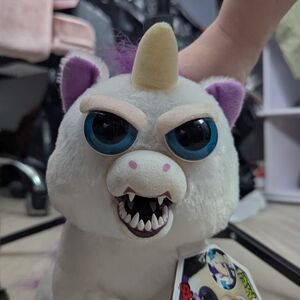 Fierce White Unicorn Plush with Blue Eyes